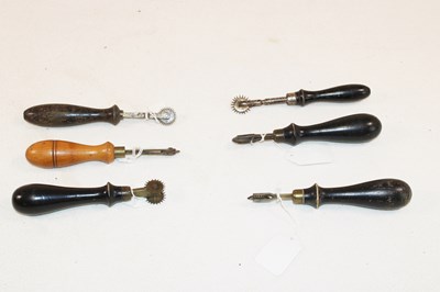 Lot 1113 - Six Victorian turned wooden handled pricking...