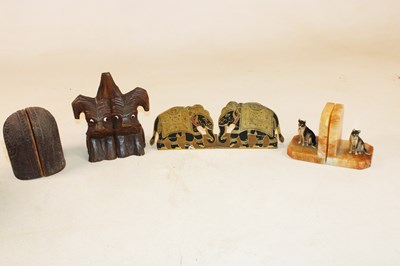 Lot 1040 - Four pairs of book ends including an unusual...