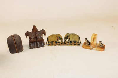 Lot 1040 - Four pairs of book ends including an unusual...