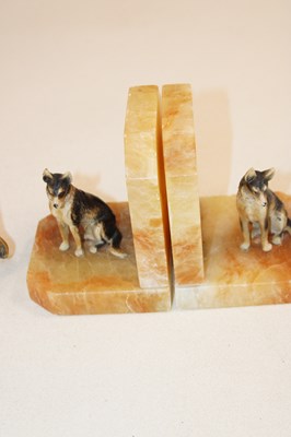 Lot 1040 - Four pairs of book ends including an unusual...
