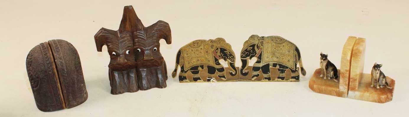 Lot 1040 - Four pairs of book ends including an unusual...