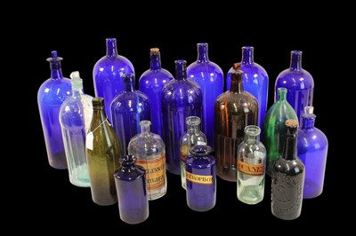 Lot 1153 - A collection of vintage glass apothecary jars,...