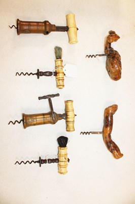 Lot 1004 - Four Victorian bone handled corkscrews, two...