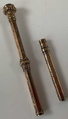 Lot 558 - A rose gold coloured unmarked propelling...