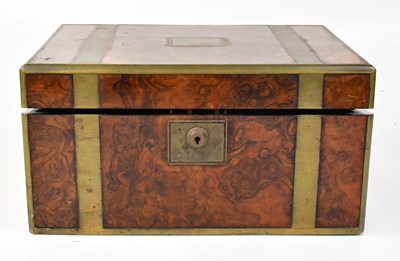 Lot 695 - A burr walnut brass bound writing slope with...