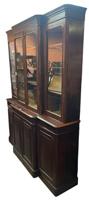 Lot 1162 - A Victorian mahogany breakfront bookcase, with...
