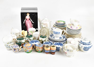 Lot 266 - A collection of decorative ceramics and silver...