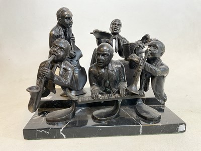 Lot 210 - UNATTRIBUTED; a bronze group of five musicians,...