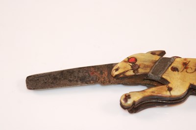 Lot 1055 - A rare 18th century carved horn pocket knife...
