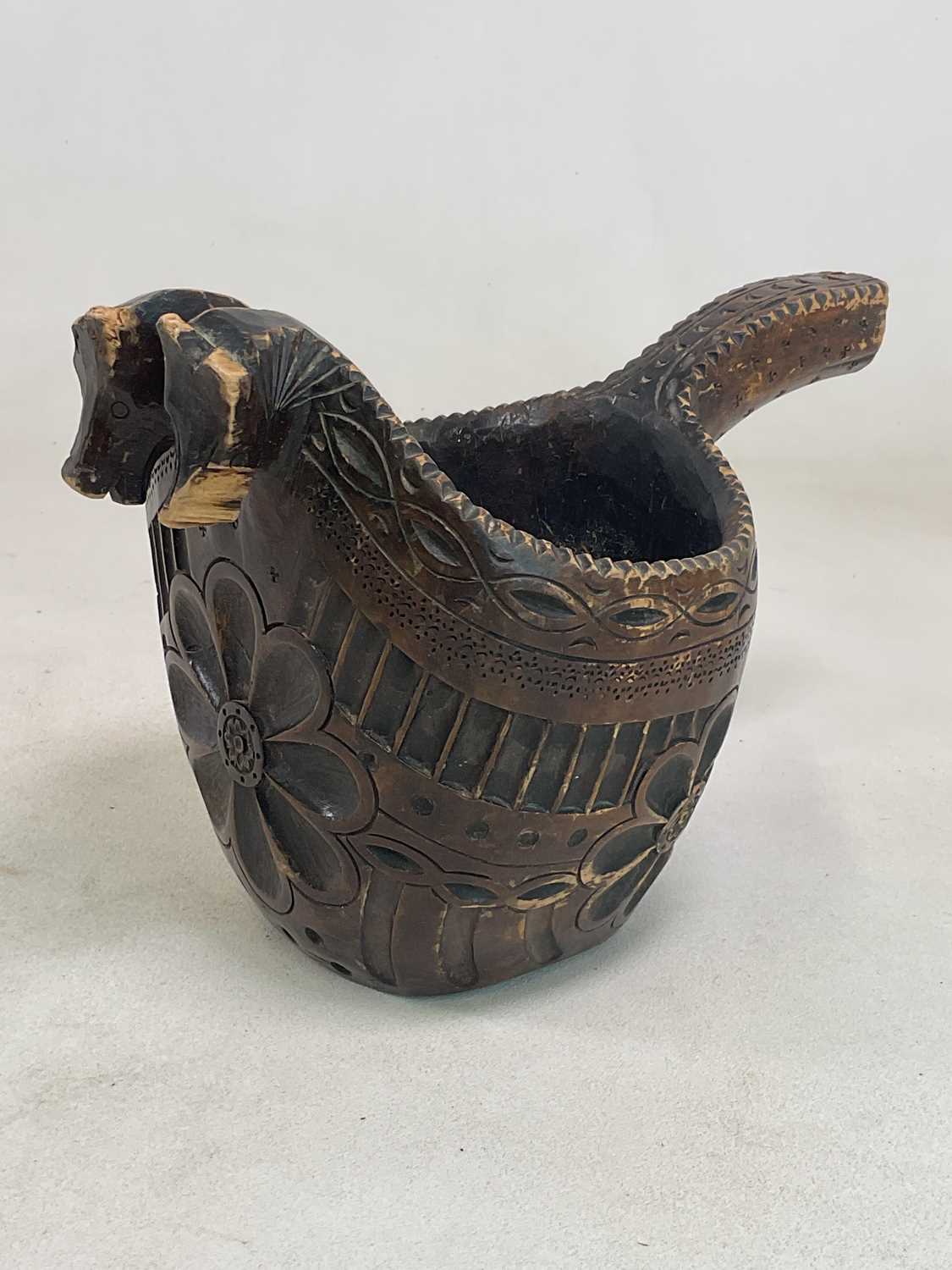 Lot 22 - A 19th century Norwegian large carved wooden...