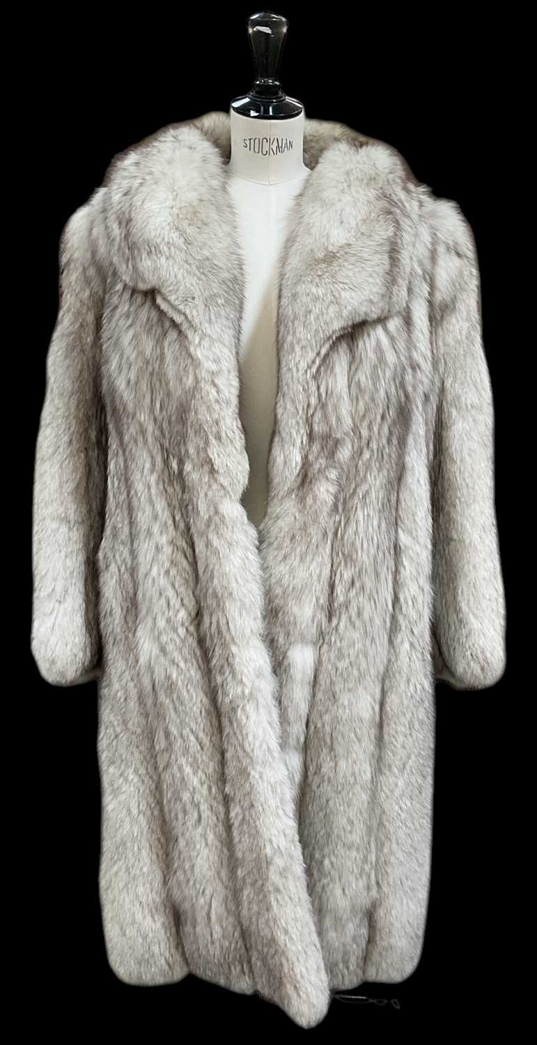 Lot 436 - A vintage full length silver fox fur coat.