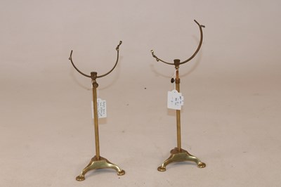 Lot 1133 - A pair of early 20th century brass shoe...