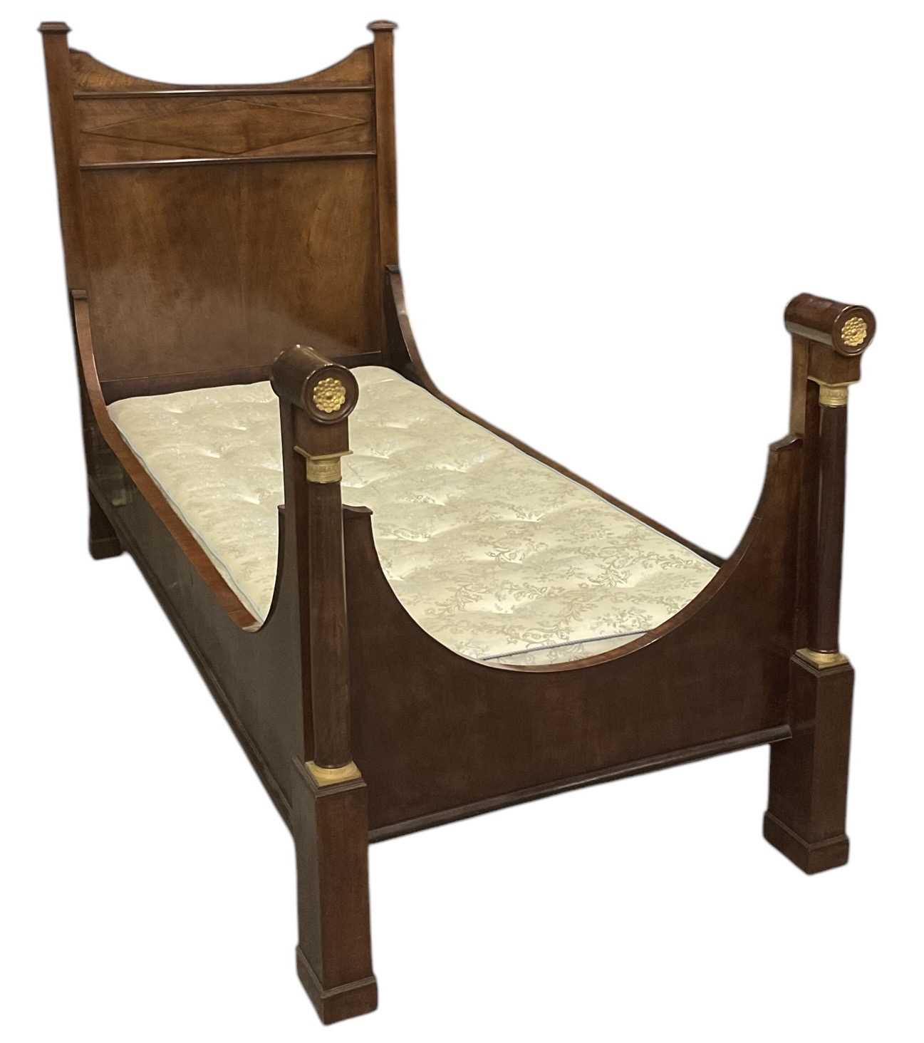 Lot 26 - A 19th century French Empire mahogany gilt...