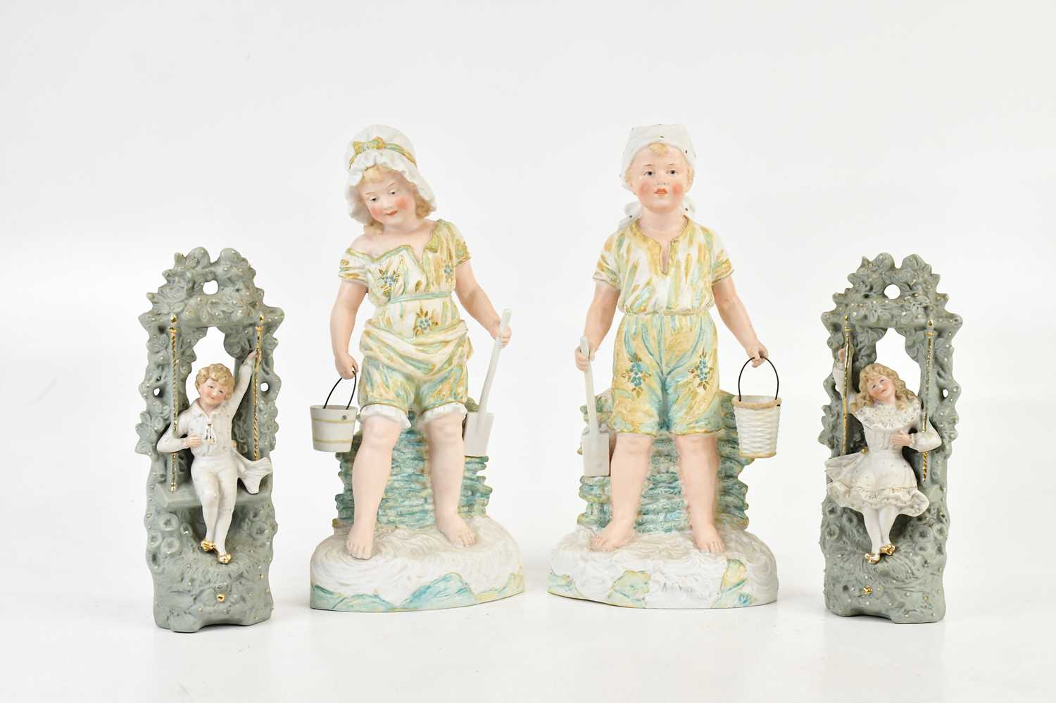 Lot 156 - GOSS & COMPANY; a pair of painted Parian ware...