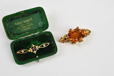 Lot 99 - A Victorian yellow metal citrine set bar...