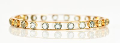 Lot 26 - A Victorian yellow metal bangle set with...