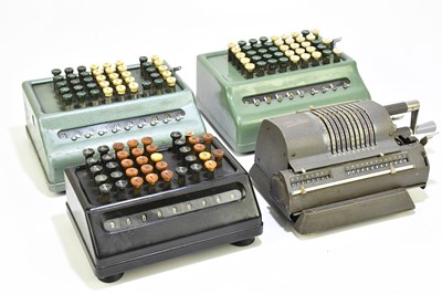 Lot 1469 - Three vintage calculators, including a Plus...