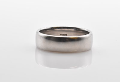 Lot 496 - A platinum wedding band, size Q, approx 6.3g.
