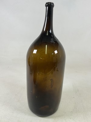 Lot 1160 - A very large 19th century brown glass bottle,...