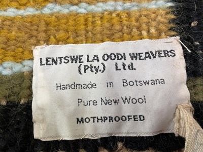 Lot 87 - A woollen Botswana wall hanging, depicting a...