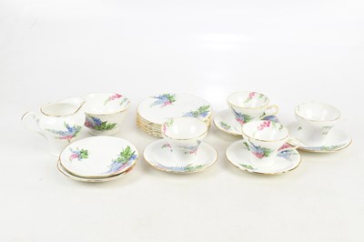 Lot 280 - AYNSLEY; a floral decorated tea set including...
