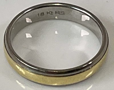 Lot 491 - An 18ct yellow gold and platinum wedding band,...