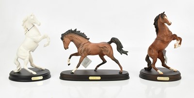 Lot 2529 - BESWICK; three models of horses comprising...
