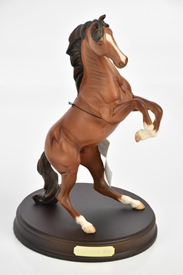 Lot 2529 - BESWICK; three models of horses comprising...