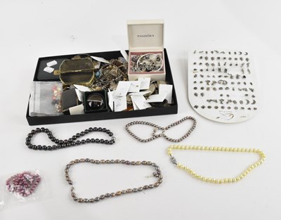 Lot 147 - A collection of costume jewellery, including...