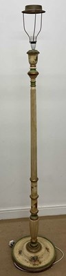 Lot 667 - A painted floral floor lamp fitted with brass...