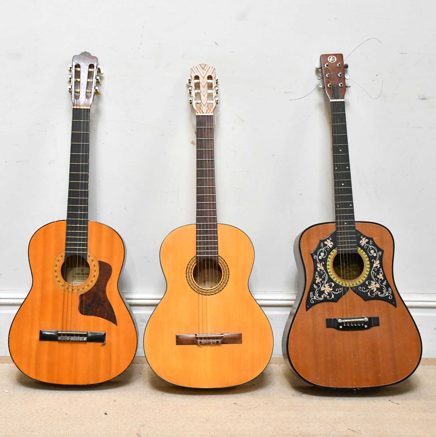 Lot 1103 - A collection of three acoustic guitars...