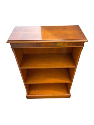Lot 2231 - A reproduction yew wood bookcase, height 91cm,...