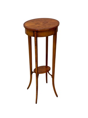 Lot 2232 - A reproduction yew wood oval side table,...