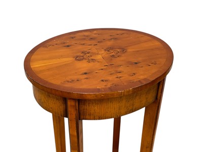Lot 2232 - A reproduction yew wood oval side table,...