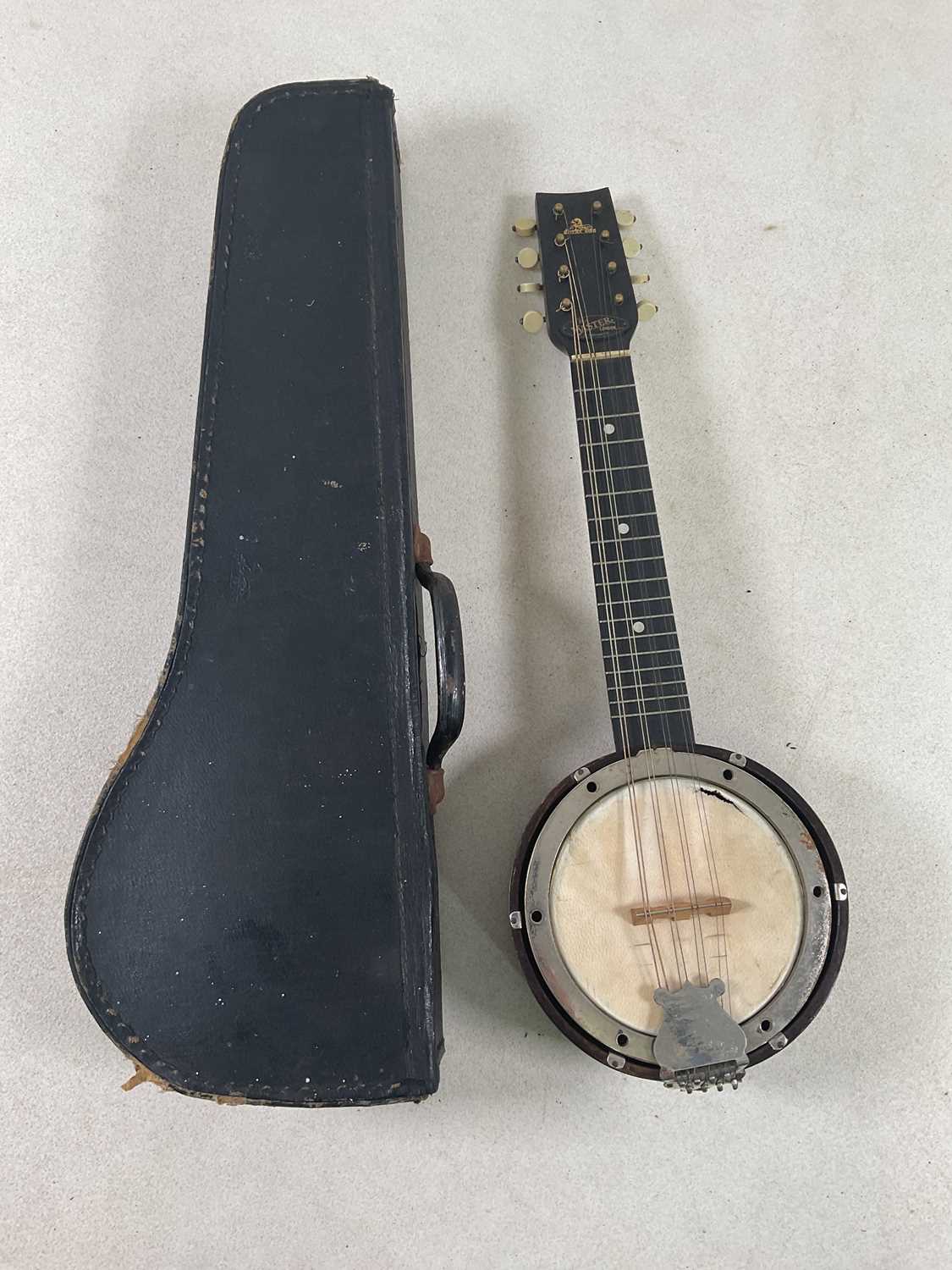 Lot 116 - A cased banjolele, bearing label inscribed...