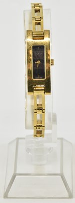 Lot 1493 - GUCCI; a lady's model 3900L gold plated...