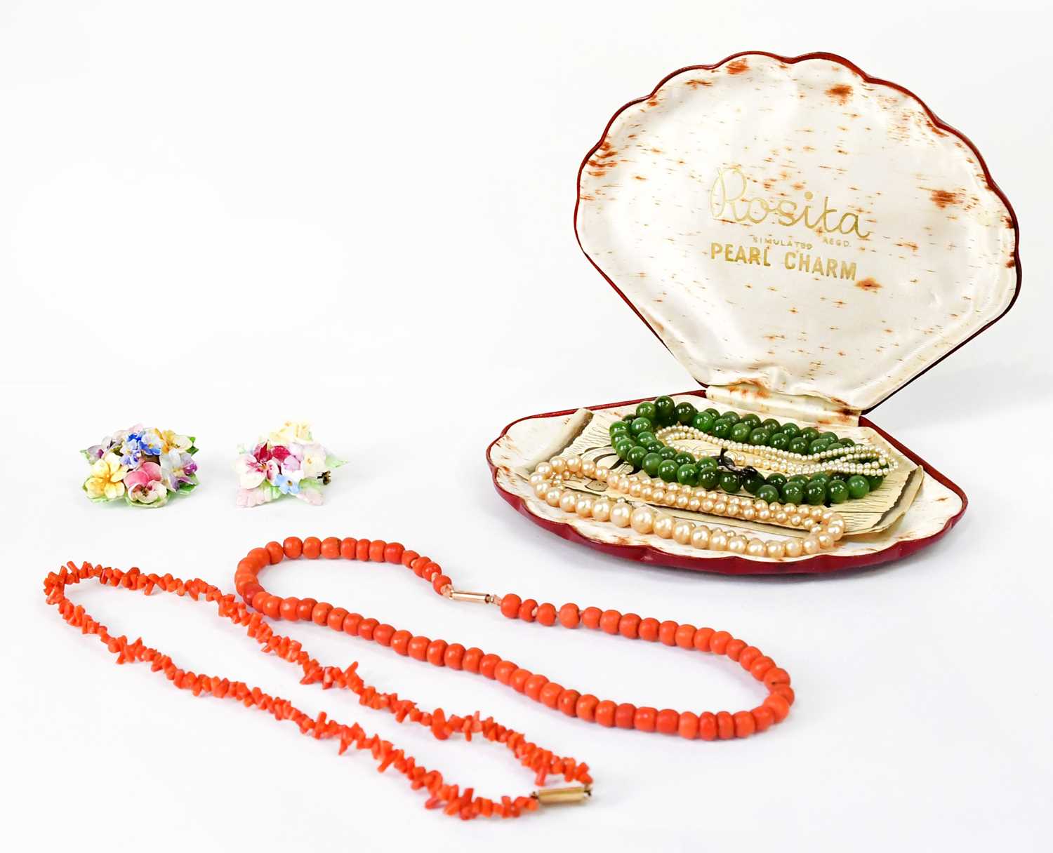 Lot 1127 - A coral beaded necklace with a 9ct rose gold...