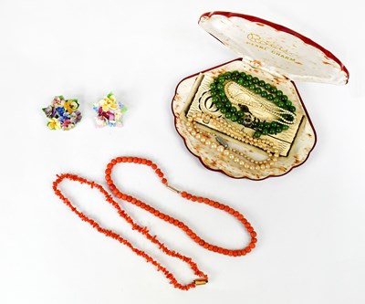 Lot 1127 - A coral beaded necklace with a 9ct rose gold...