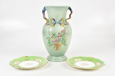 Lot 2563 - CLARICE CLIFF; a large twin handled vase with...