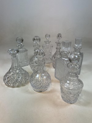 Lot 332 - A group of nine cut glass decanters including...