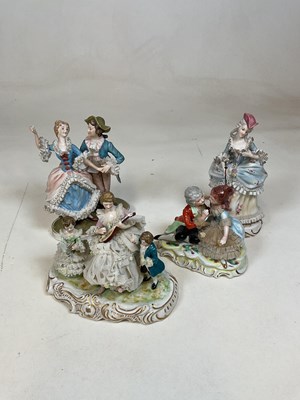 Lot 231 - A group of decorative porcelain figures...