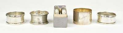 Lot 1109 - Six hallmarked silver napkin rings, comprising...