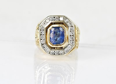 Lot 1314 - A 14ct yellow gold ring set with a central...