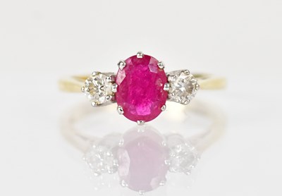 Lot 1278 - An 18ct yellow gold ring, set with a central...