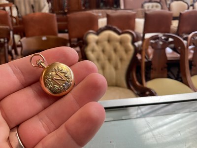 Lot 1657 - TIFFANY & CO, NEW YORK; a miniature yellow...