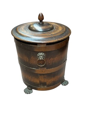 Lot 2105 - A large coopered oak coal bucket, with lion...