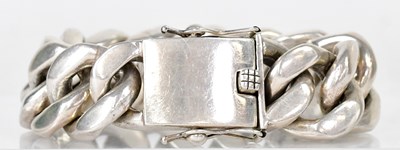 Lot 1422 - A substantial silver curb link chain bracelet,...