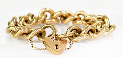 Lot 1407 - A 9ct yellow gold curb link chain bracelet,...