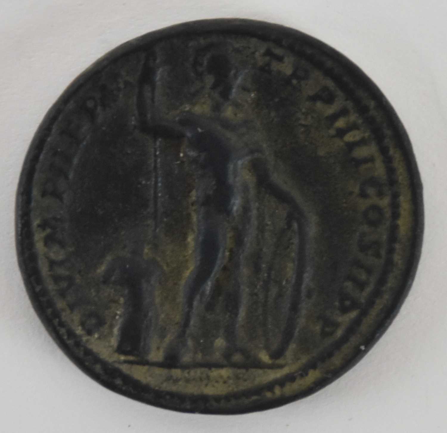Lot 1412 - An Ancient Roman style bronze coin, possibly...