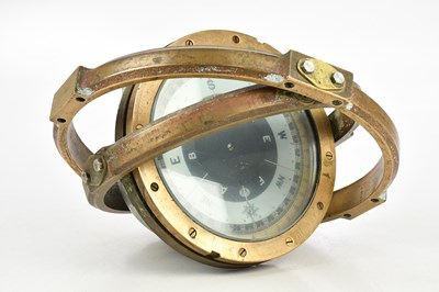 Lot 2467 - A brass ship's gimbal compass, diameter 25cm.
